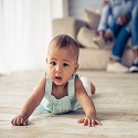 baby crawling on floor